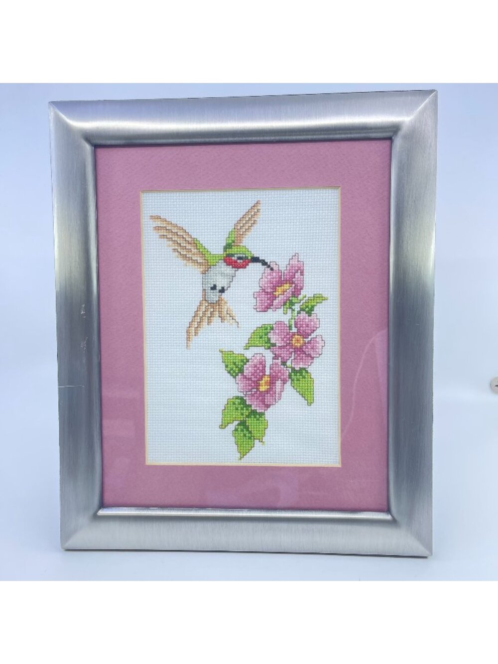 vintage framed hummingbird & pink blossom cross-stitch artwork with silver frame